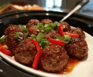 Delicious homemade sweet chili meatballs cooked in a crockpot, served with a glossy sweet chili glaze, perfect for appetizer or dinner