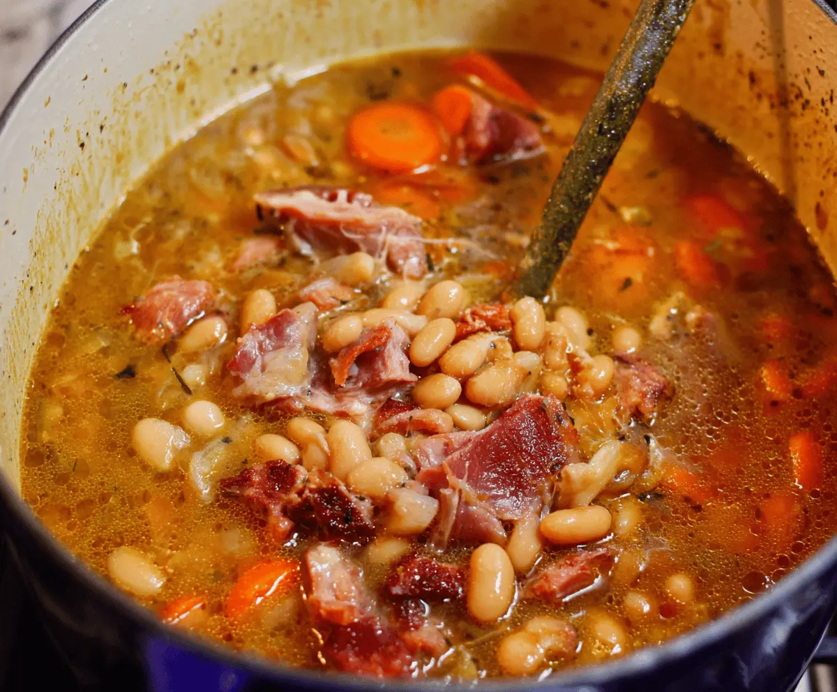 Delicious beans cooked with tender ham hocks, seasoned and ready to serve