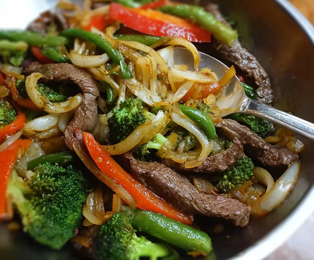 Delicious easy beef stir fry with colorful vegetables on a plate, perfect for quick weeknight dinners.