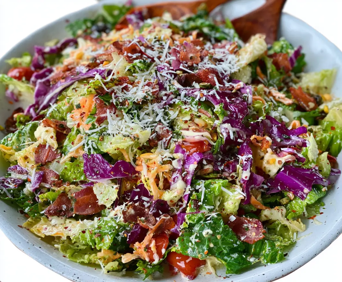 Fresh Pizza Night Salad with colorful vegetables and croutons, perfect for a light dinner.