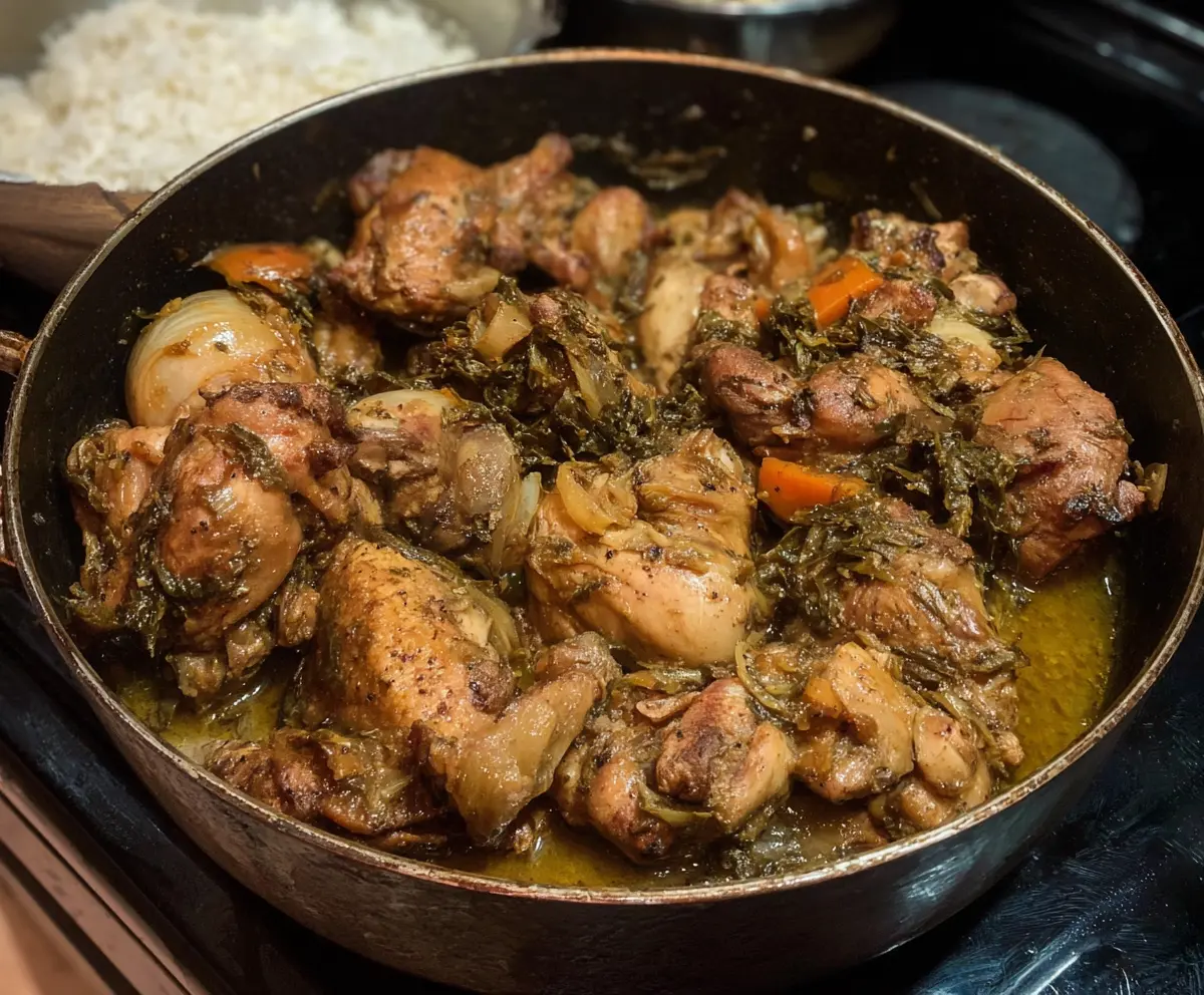 Juicy Jamaican Fricassee Chicken served with rice and vegetables